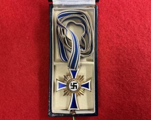 Cassed Mother Cross In Gold