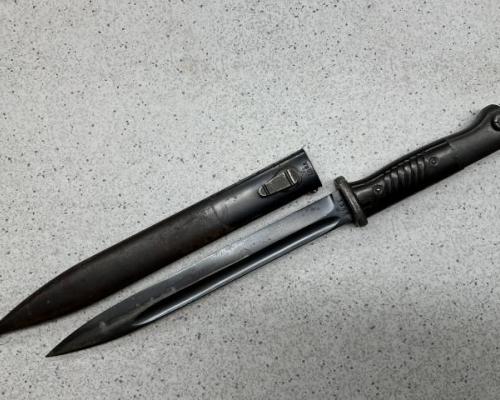 marked MUNDLOS on the front of blade and scabbard. Number are mismatching on the back. Never sharpened and dated 38 on the front of the scabbard.